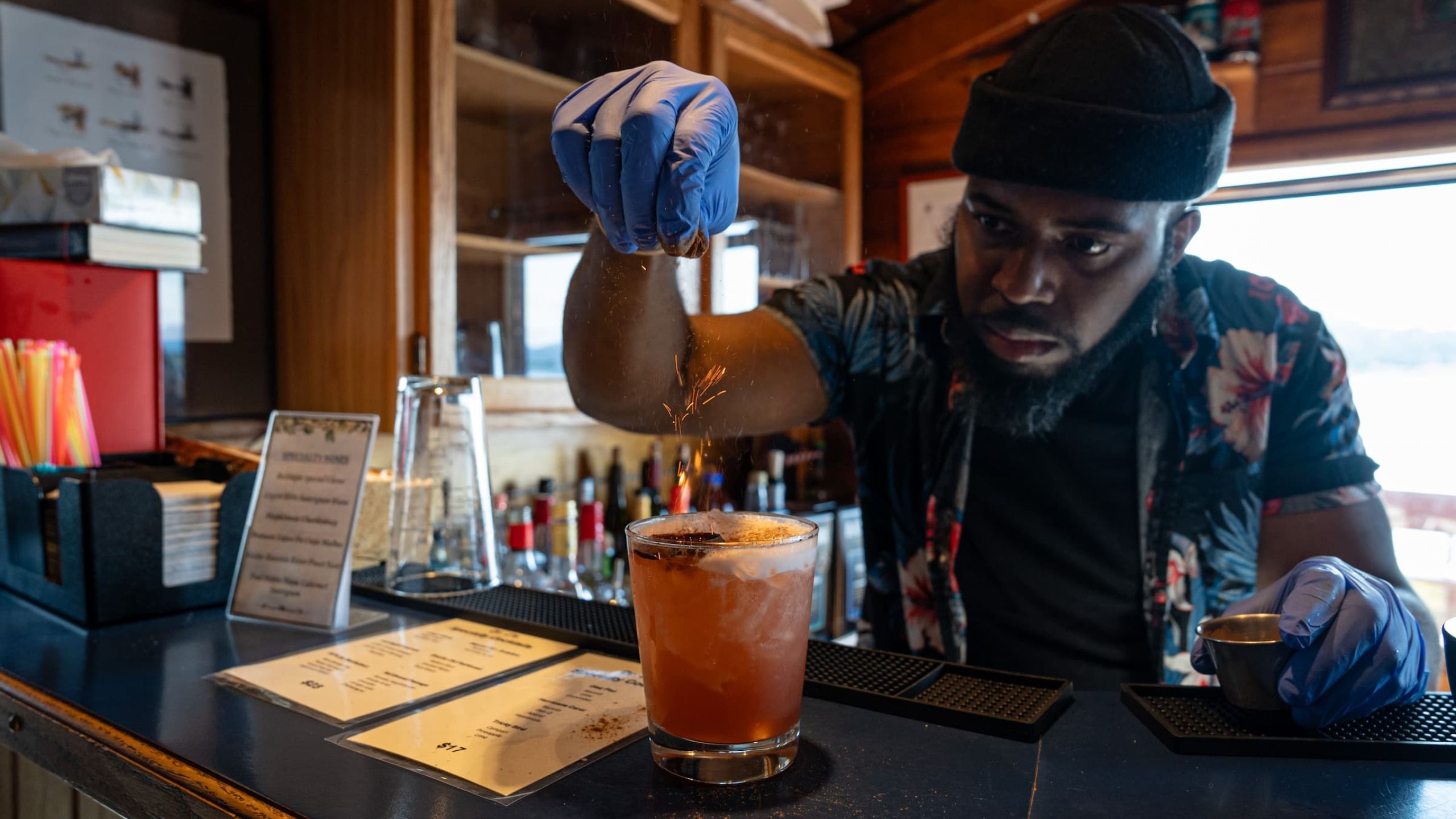 Tikchik Narrows Bartender Mixing Drinks  