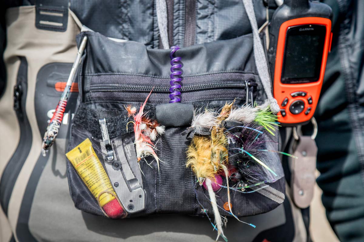 Alaska fishing guide's loaded waders with gear